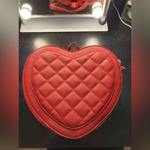 Red heart shaped Underonesky backpack